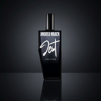 Black perfume bottle with 'Andrea Maack' branding on a white background