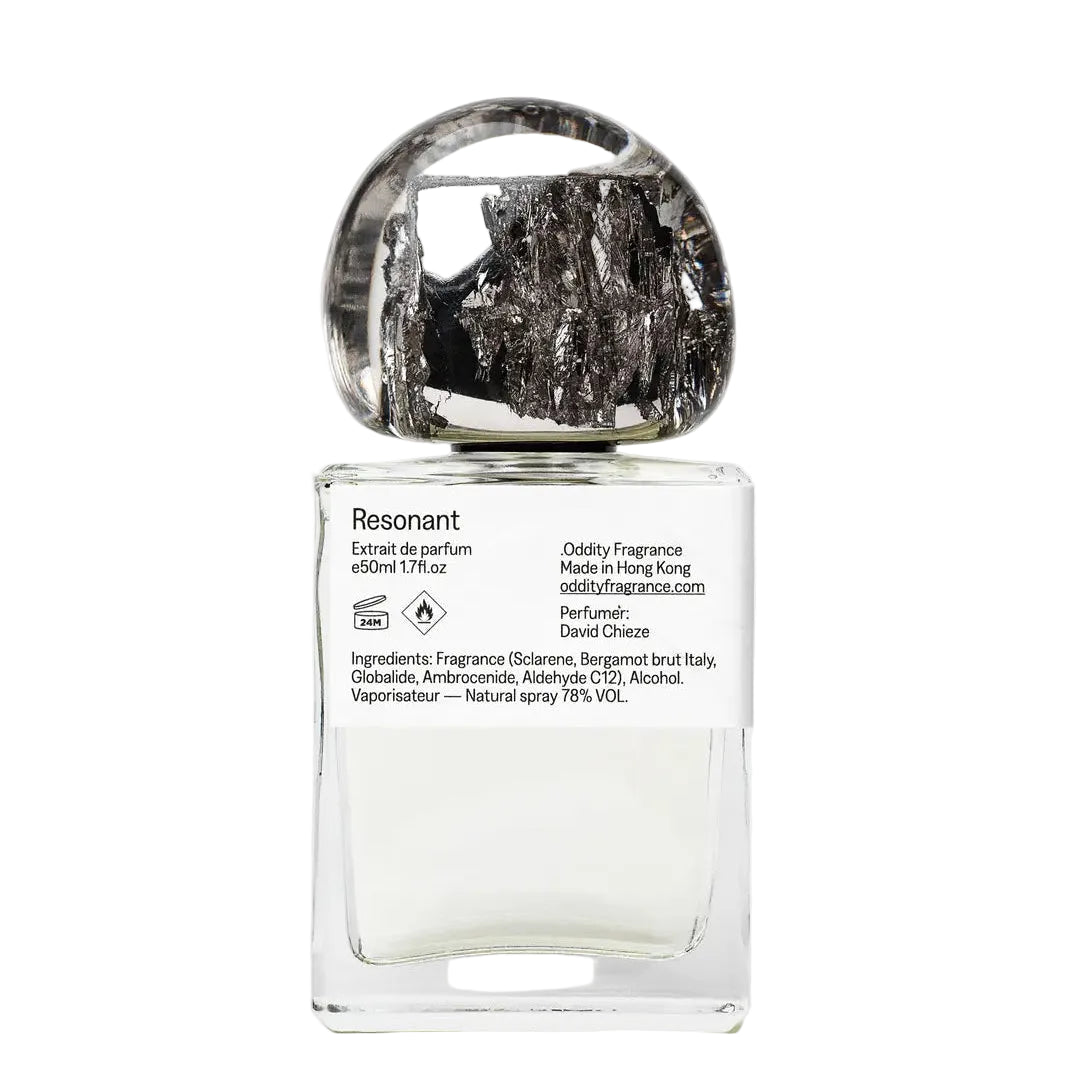 Perfume bottle labeled 'Resonant' on a white background