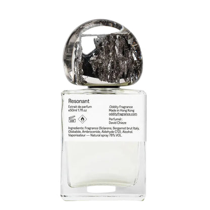 Perfume bottle labeled 'Resonant' on a white background